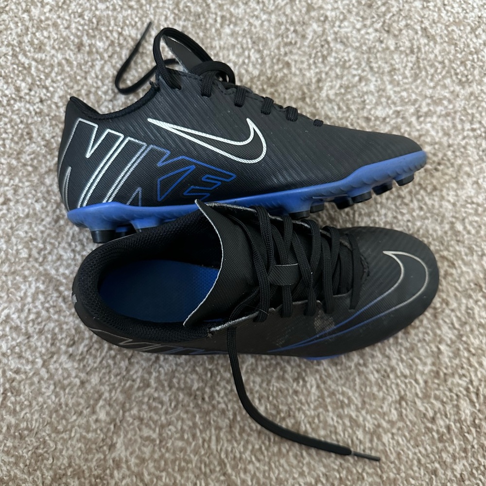 Nike Kid’s Black and Blue Cleats